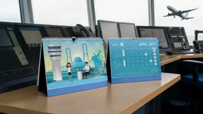AirNav Indonesia - Kalender 2023 - Desain dengan Ilustrasi Penuh Warna yang Unik